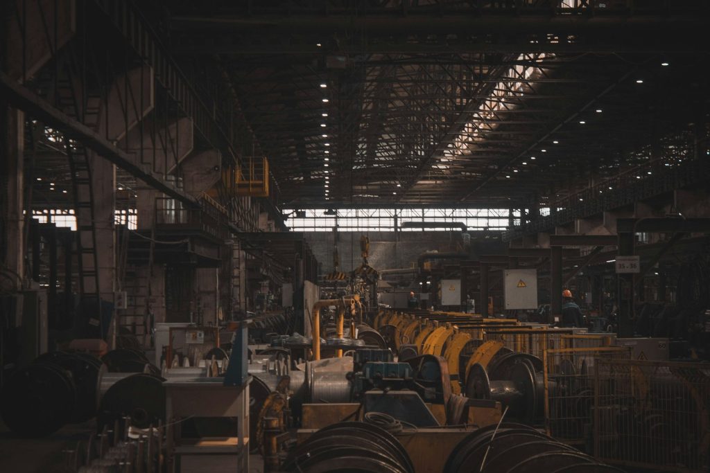 Factory hall with heavy machinery and production lines