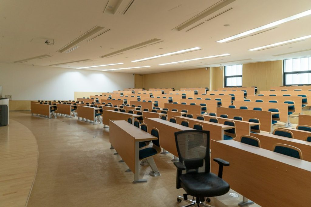 Empty classroom with rows of chairs, ready for a safety training session