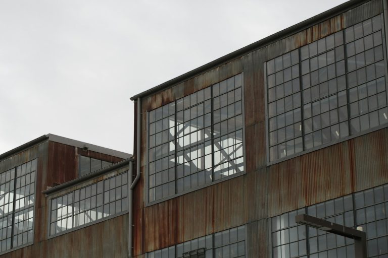 Weathered corrugated asbestos roof on an old industrial building