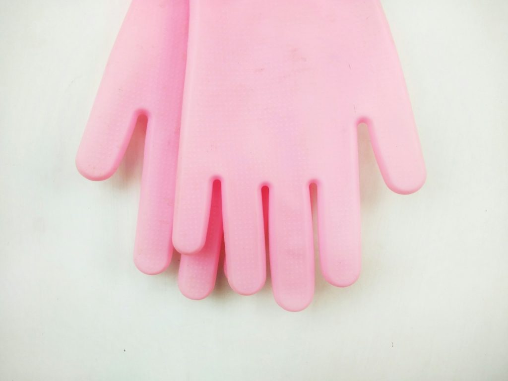 Rubber cleaning gloves on a kitchen counter